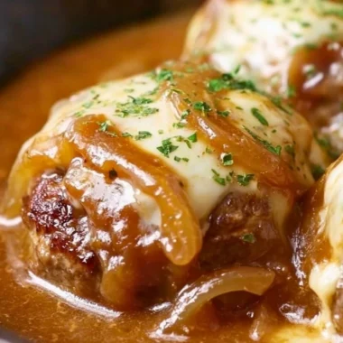 Delicious French Onion Salisbury Steak served with gravy and caramelized onions