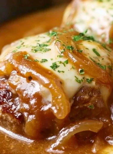 Delicious French Onion Salisbury Steak served with gravy and caramelized onions