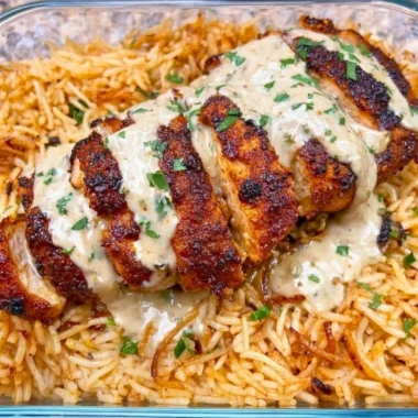High protein creamy Cajun chicken served with rice in a bowl