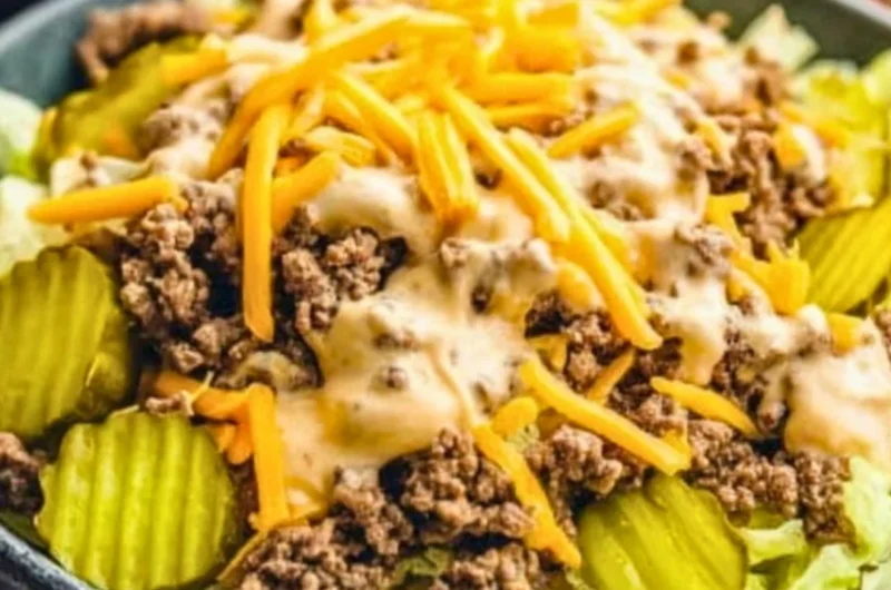 Keto Big Mac Salad with lettuce, burger patties, cheese, and special sauce