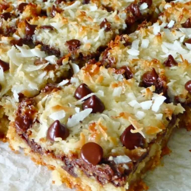 Delicious Magic Cookie Bars topped with chocolate and nuts