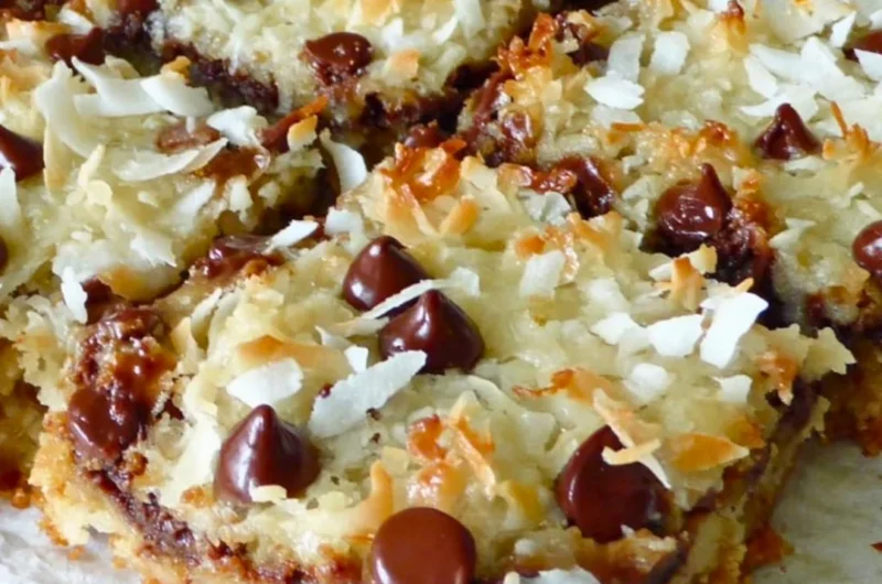 Delicious Magic Cookie Bars topped with chocolate and nuts
