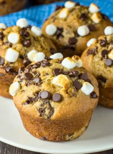 Delicious Banana S'mores Muffins with chocolate and marshmallow topping