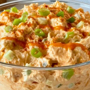 Delicious Buffalo Chicken Salad with spicy chicken, greens, and dressing