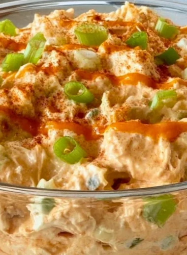 Delicious Buffalo Chicken Salad with spicy chicken, greens, and dressing