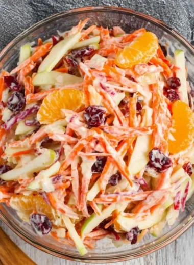 Fresh Carrot Apple Salad with vibrant colors and healthy ingredients.