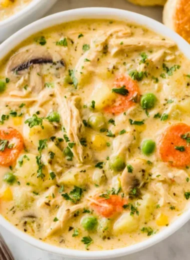 Delicious Chicken Pot Pie Soup with chicken, vegetables, and creamy broth