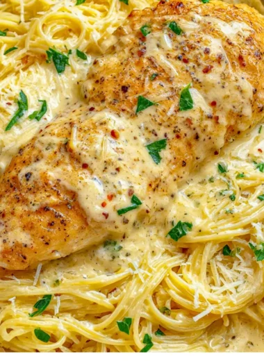 Crock Pot Angel Chicken served with a side of vegetables and rice