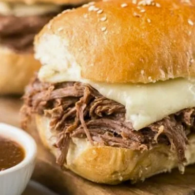 Delicious Crock Pot French Dip sandwich with tender beef and au jus