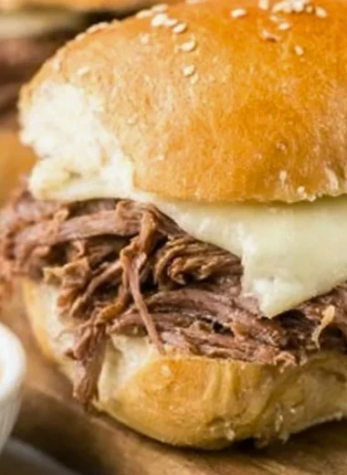 Delicious Crock Pot French Dip sandwich with tender beef and au jus