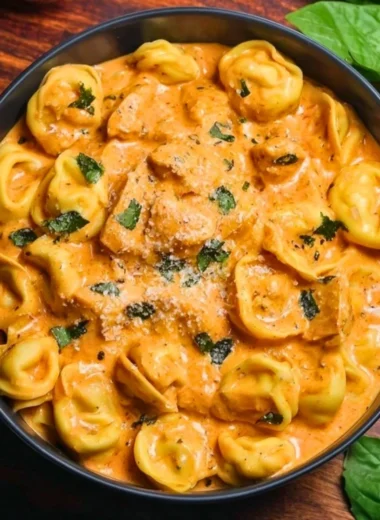 CrockPot Chicken Tortellini recipe with rich sauce and fresh ingredients