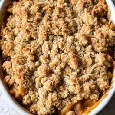 Delicious gluten-free apple crisp topped with oats and cinnamon