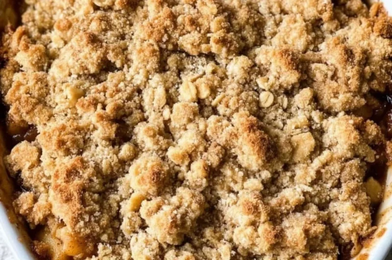 Delicious gluten-free apple crisp topped with oats and cinnamon