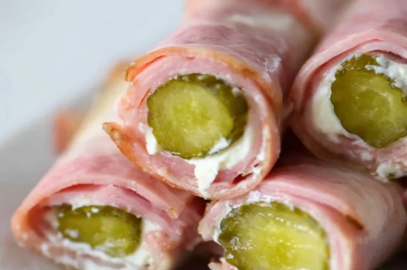 Ham and Pickle Roll-ups with Cream Cheese on a serving platter