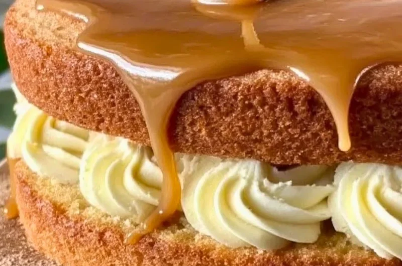 Delicious homemade Irish Whiskey Cake topped with frosting and whiskey glaze.