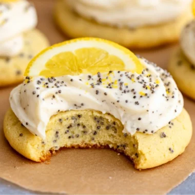 Lemon poppy seed cookies topped with creamy cheesecake frosting