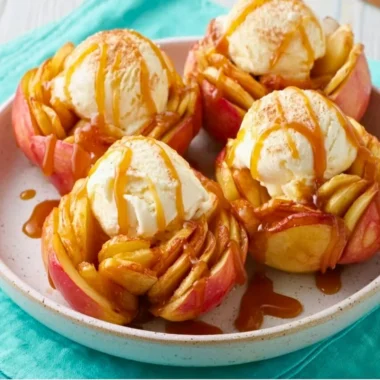 Delicious slow cooker bloomin' baked apples topped with cinnamon and nuts