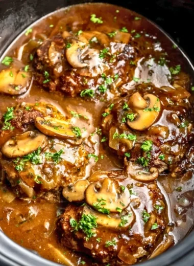 Delicious Slow Cooker Salisbury Steak with gravy and mashed potatoes