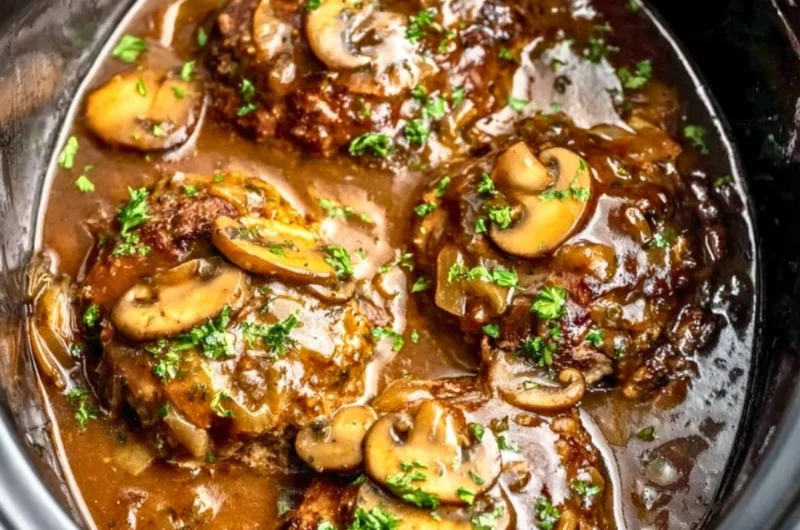 Delicious Slow Cooker Salisbury Steak with gravy and mashed potatoes
