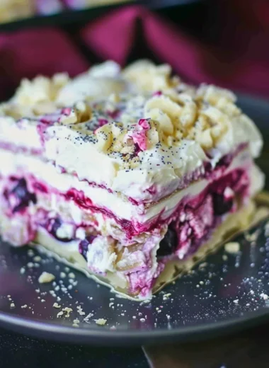 Blueberry Cream Cheesecake Lasagna dessert layered with creamy blueberry filling