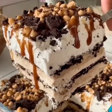 A delicious homemade ice cream cake topped with chocolate and berries