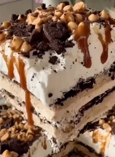 A delicious homemade ice cream cake topped with chocolate and berries