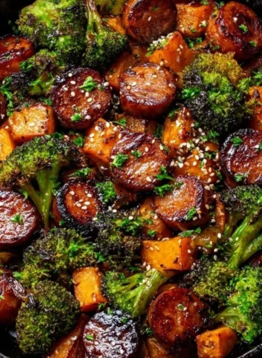Honey garlic sausage with sweet potatoes on a sheet pan for a flavorful dinner