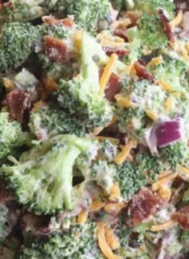 Delicious Keto Broccoli Salad with cheese and bacon in a bowl