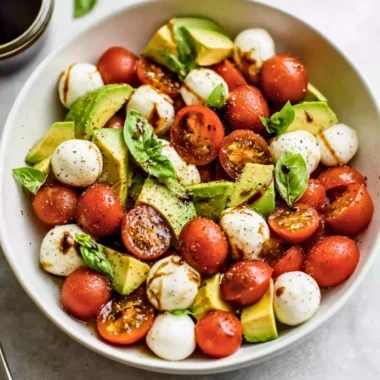 Delicious Light Avocado Caprese Salad with tomatoes and basil
