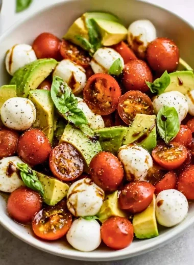 Delicious Light Avocado Caprese Salad with tomatoes and basil