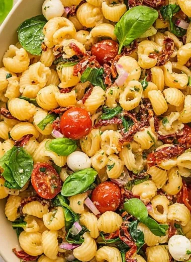 Delicious Sun Dried Tomato Pasta Salad with vibrant ingredients