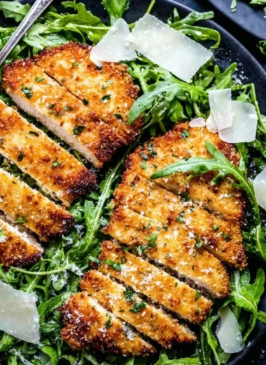 Crispy air-fryer breaded chicken breast served on a plate