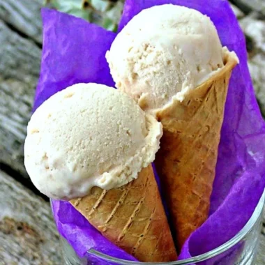 Delicious banana frozen yogurt topped with fresh banana slices and nuts