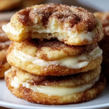 Delicious cinnamon roll cheesecake cookies on a plate