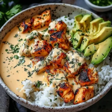 Coconut Chicken Rice Bowl topped with fresh ingredients and served in a bowl