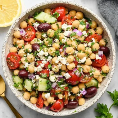 Colorful Mediterranean Chickpea Salad with fresh vegetables and herbs