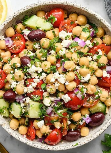 Colorful Mediterranean Chickpea Salad with fresh vegetables and herbs
