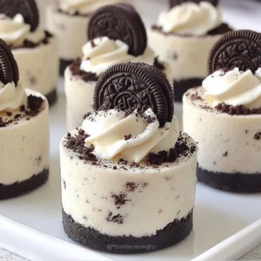 Delicious no-bake Oreo cheesecakes topped with crushed Oreos.